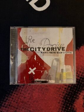 THE CITY DRIVE 2006 Always Moving Never Stopping CD (Hole Punch)
